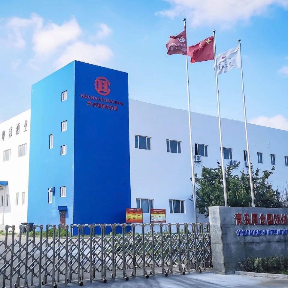 Pouring red wine into a glass